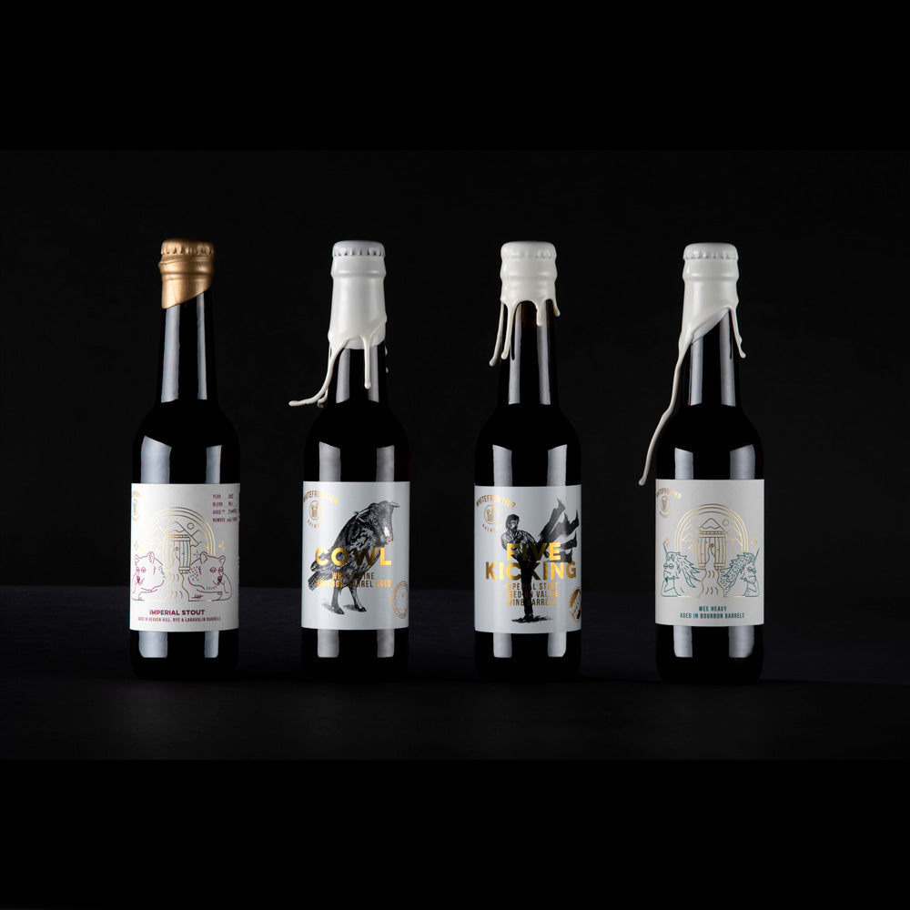 4 bières barrel aged sur fond noir