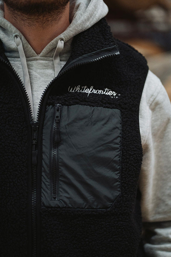 SCHWARZE SHERPA-WESTE