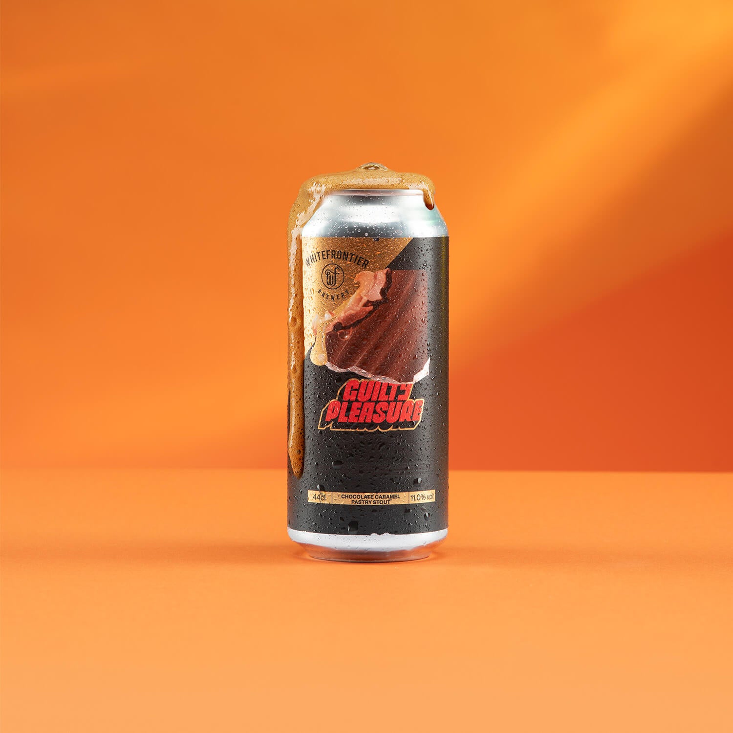 Bière guilty pleasure caramel et chocolat fond orange